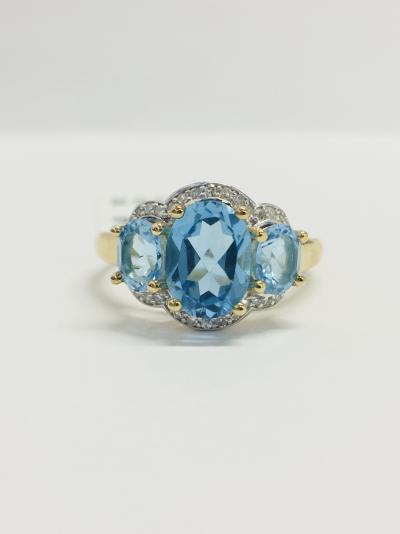 Bague or jaune topaze bleue et diamants 2