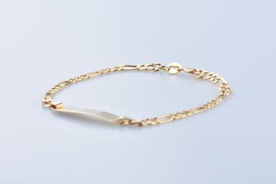 Bracelet gourmette bébé en or jaune 18 carats. 2