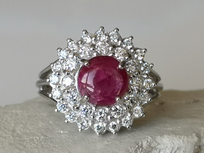 Daisy ring in 18 carat white gold adorned in its centre with a 4.08 carat Burmese unheated ruby and diamonds 2