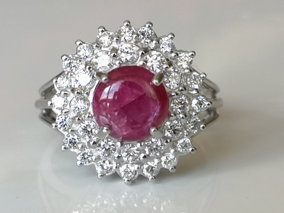 Daisy ring in 18 carat white gold adorned in its centre with a 4.08 carat Burmese unheated ruby and diamonds 2