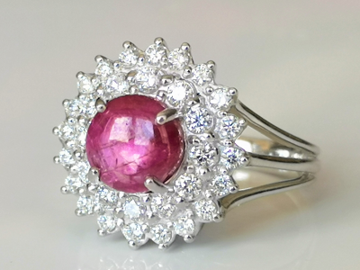 Daisy ring in 18 carat white gold adorned in its centre with a 4.08 carat Burmese unheated ruby and diamonds 2