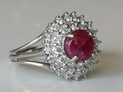 Daisy ring in 18 carat white gold adorned in its centre with a 4.08 carat Burmese unheated ruby and diamonds 2