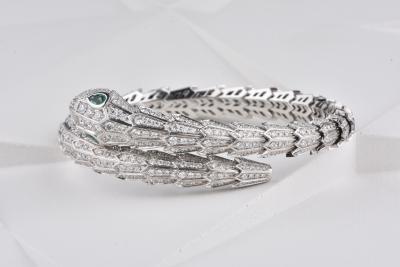Bracelet Bvlgari serpenti en or blanc pavé diamants et yeux en émeraude 2