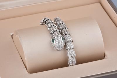 Bracelet Bvlgari serpenti en or blanc pavé diamants et yeux en émeraude 2