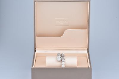 Bracelet Bvlgari serpenti en or blanc pavé diamants et yeux en émeraude 2