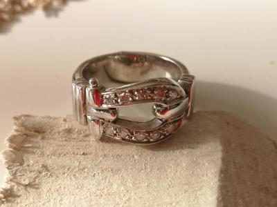 Bague à motif de boucle  en or 18 carats et acier 2