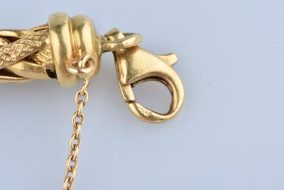 Bracelet en or jaune 18 carats, maille palmier. Fermoir anneau à ressort avec chaîne de securité. 2