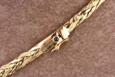 Collier Caplain Paris en or jaune 18 carats. Maille tresse brossée 2