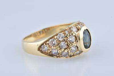 Bague en or jaune 18 carats sertie d’un saphir central de 0,50 ct et de 22 oxydes de zirconium 2