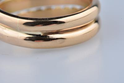 Bague serpent en or jaune 18 carats ornée de 2 diamants ronds brillants de 0,028 ct chacun soit 0,056 ct total. 2