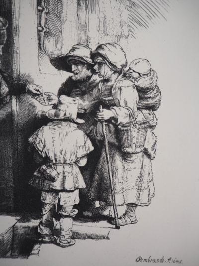 REMBRANDT (d’après) : Mendiants recevant l’aumône à la porte d’une maison,1648 - Gravure signée et numérotée 2