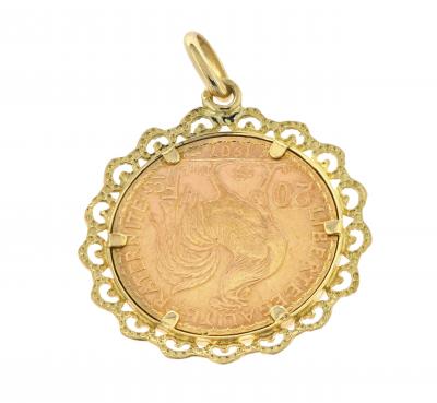 Pièce de 20 francs montée en pendentif en or jaune 18 carats. 2