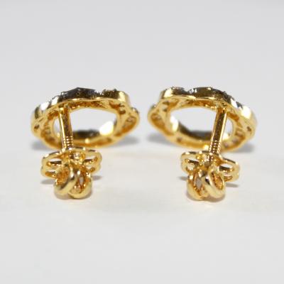 Clous d’oreilles en or jaune et diamants 2