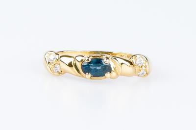 Bague Solitaire en or jaune 18 carats ornée d’un saphir ovale 2