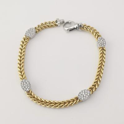 bracelet en or 18 carats 2 tons et diamants 0.59 ct 2