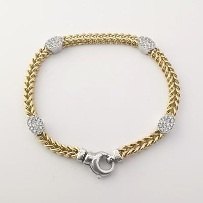 bracelet en or 18 carats 2 tons et diamants 0.59 ct