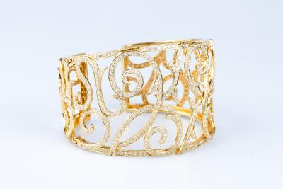 Magnifique bracelet de haute joaillerie en or jaune 14 carats 2