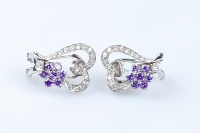 Boucles d’oreilles coeurs et fleurs en or blanc 18 carats 2