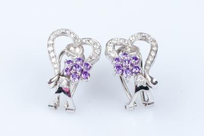 Boucles d’oreilles coeurs et fleurs en or blanc 18 carats 2