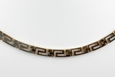 Collier semi-rigide en or jaune 18 carats 2