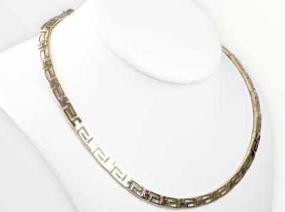 Collier semi-rigide en or jaune 18 carats 2