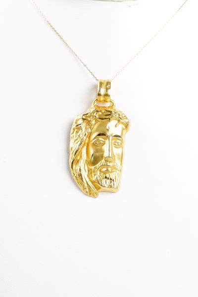 Collier en or jaune 18 carats composé d’une chaine et d’un pendentif Jesus Christ en or jaune 2