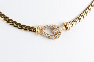 Collier fer a cheval en Or 18 Carats diamants